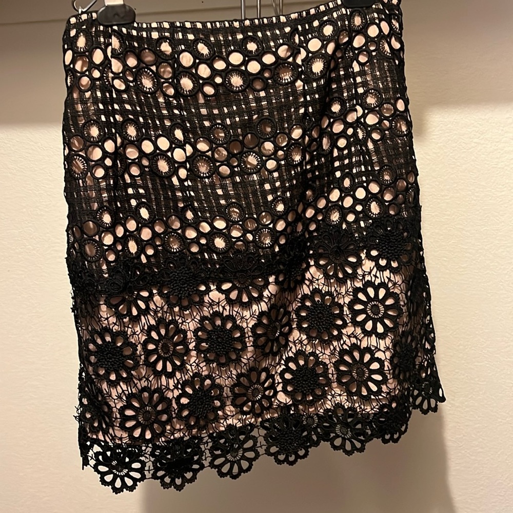 Skirt: black floral shell with beige skirt